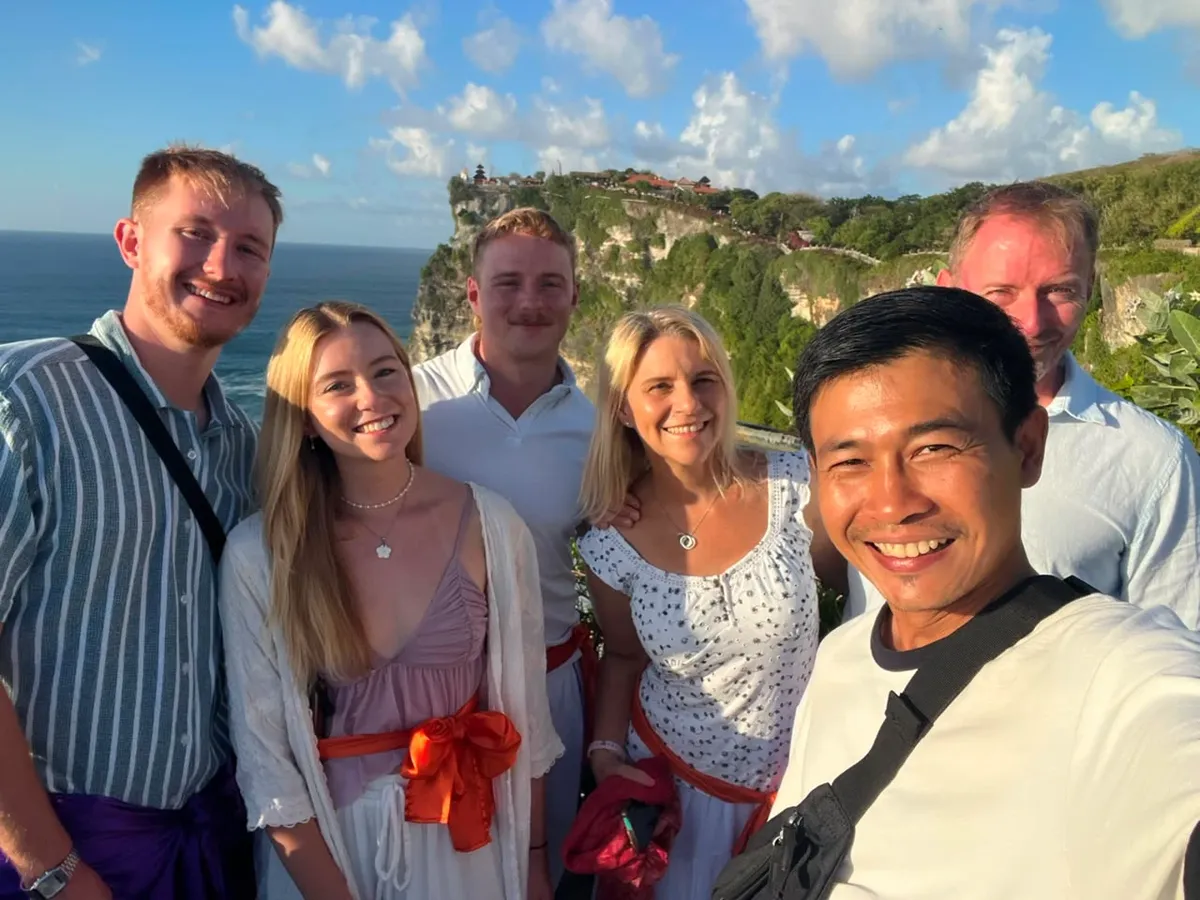 Eka with guests at Uluwatu Temple cliffs